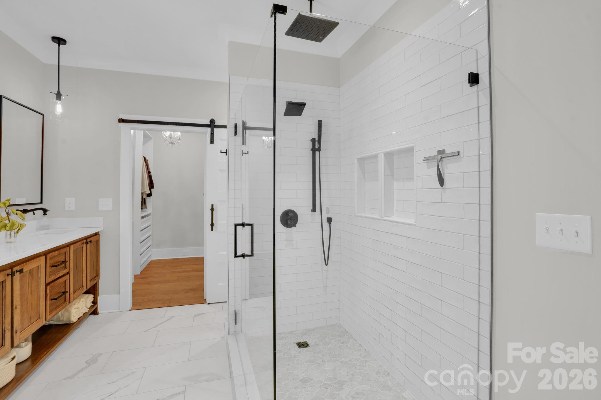 3134 Ranger Road Clover, SC 29710 - Photo 18 of 29 a bathroom with a shower sink and mirror