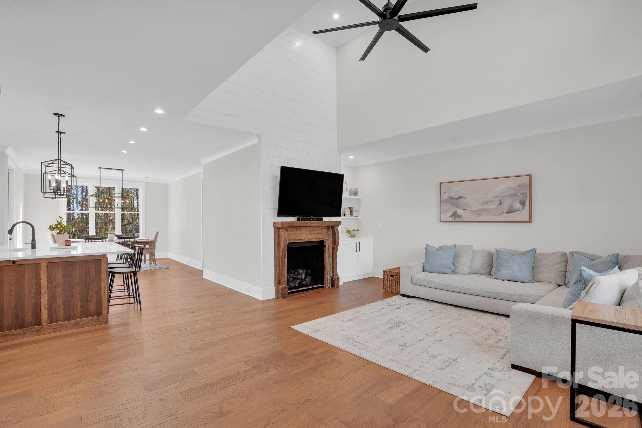 3134 Ranger Road Clover, SC 29710 - Photo 5 of 29 a living room with furniture a fireplace and a flat screen tv