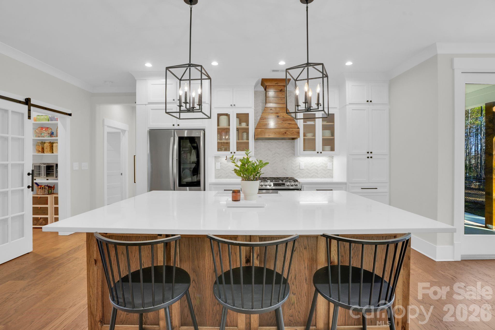 3134 Ranger Road Clover, SC 29710 - Photo 9 of 29 a view of a dining room with furniture wooden floor and chandelier
