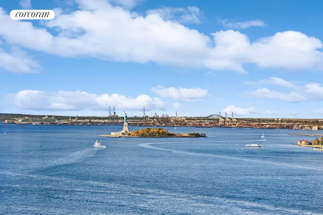 a view of an ocean and city