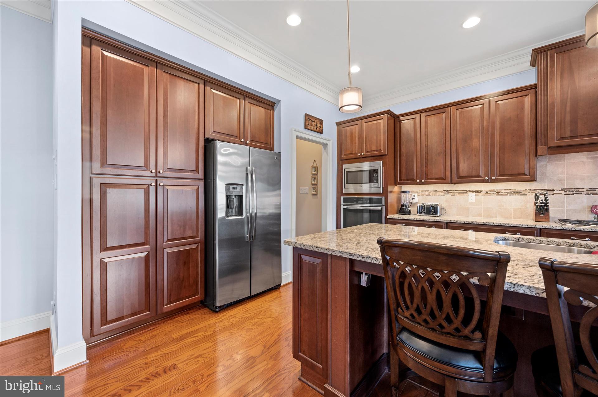32800 Widgeon Road Ocean View, DE 19970 - Photo 19 of 40 Beautiful pantry and cabinets