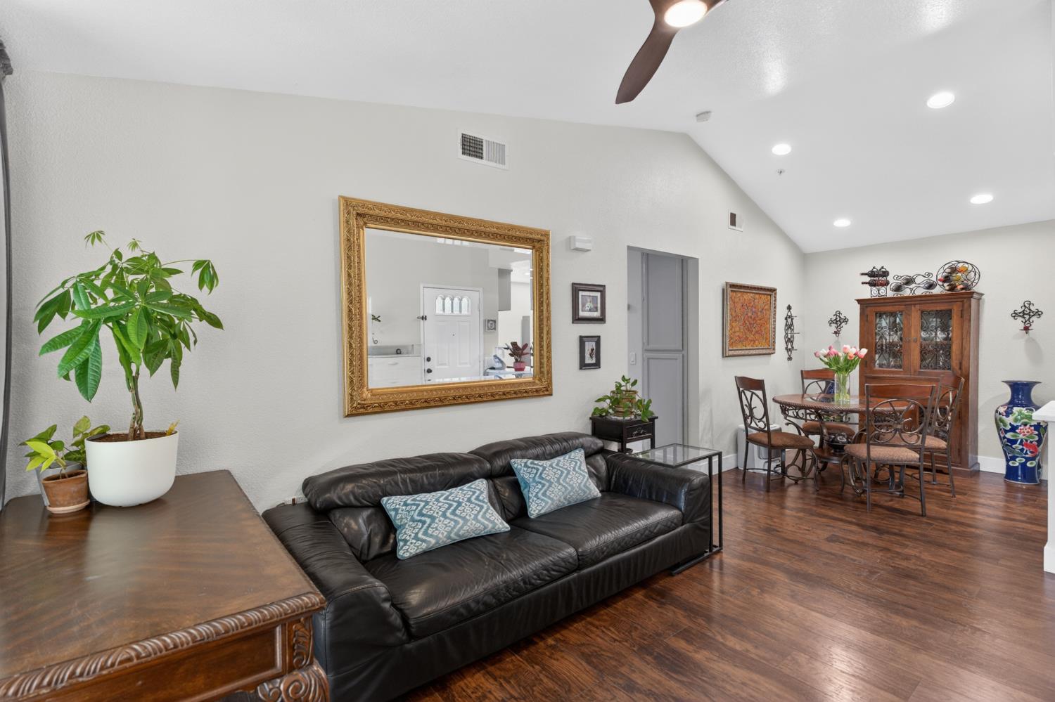 8020 Walerga Road, Unit 1140 Antelope, CA 95843 - Photo 16 of 37 a living room with furniture and wooden floor