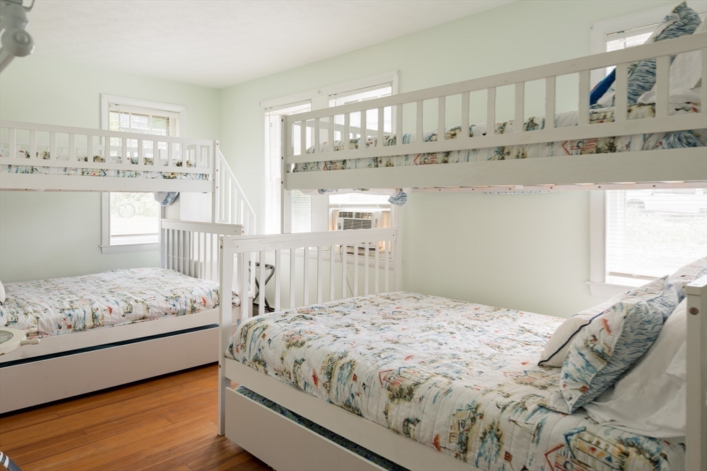 57 Oak Street Wareham, MA 02571 - Photo 16 of 42 a bedroom with a bed and window