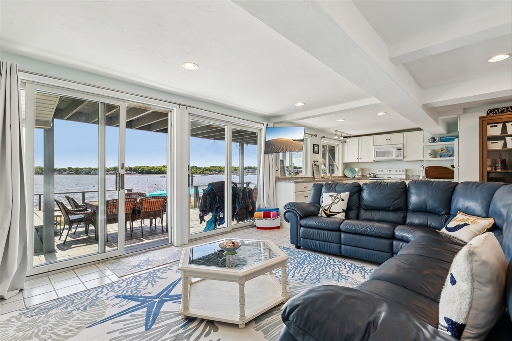 57 Oak Street Wareham, MA 02571 - Photo 20 of 42 a living room with furniture and a large window