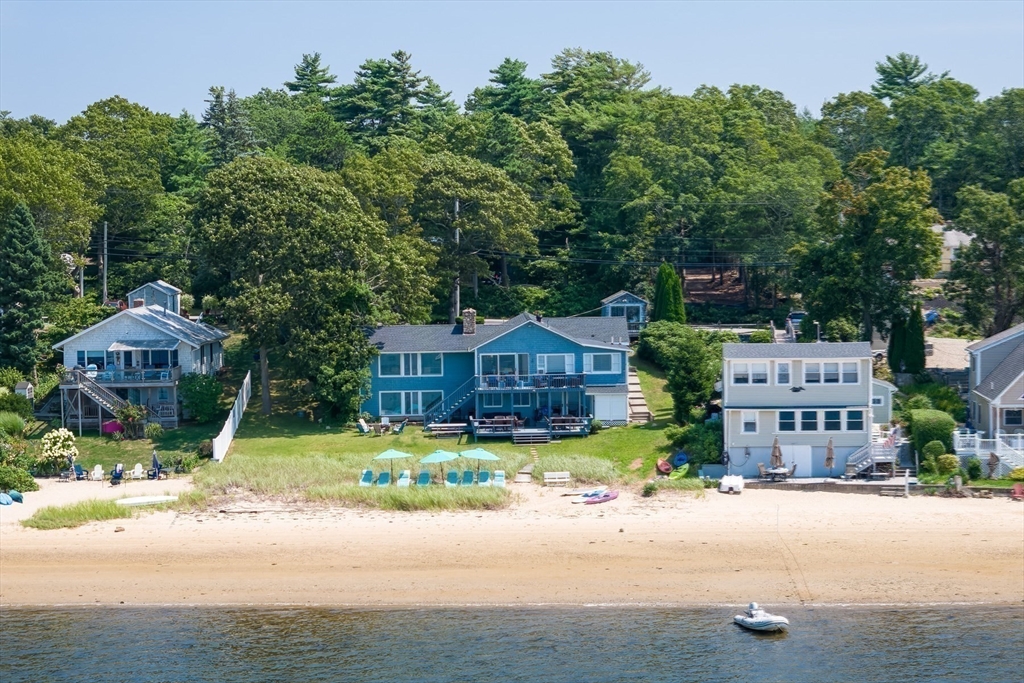57 Oak Street Wareham, MA 02571 - Photo 2 of 42 front view of a house with a street