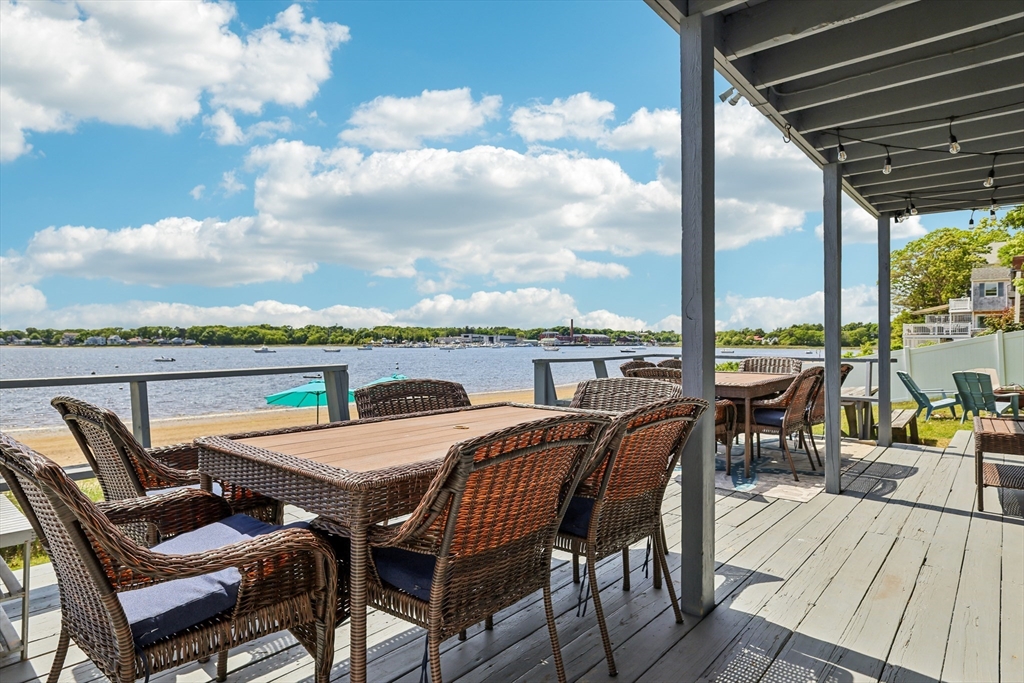57 Oak Street Wareham, MA 02571 - Photo 41 of 42 a view of a terrace with furniture and stove