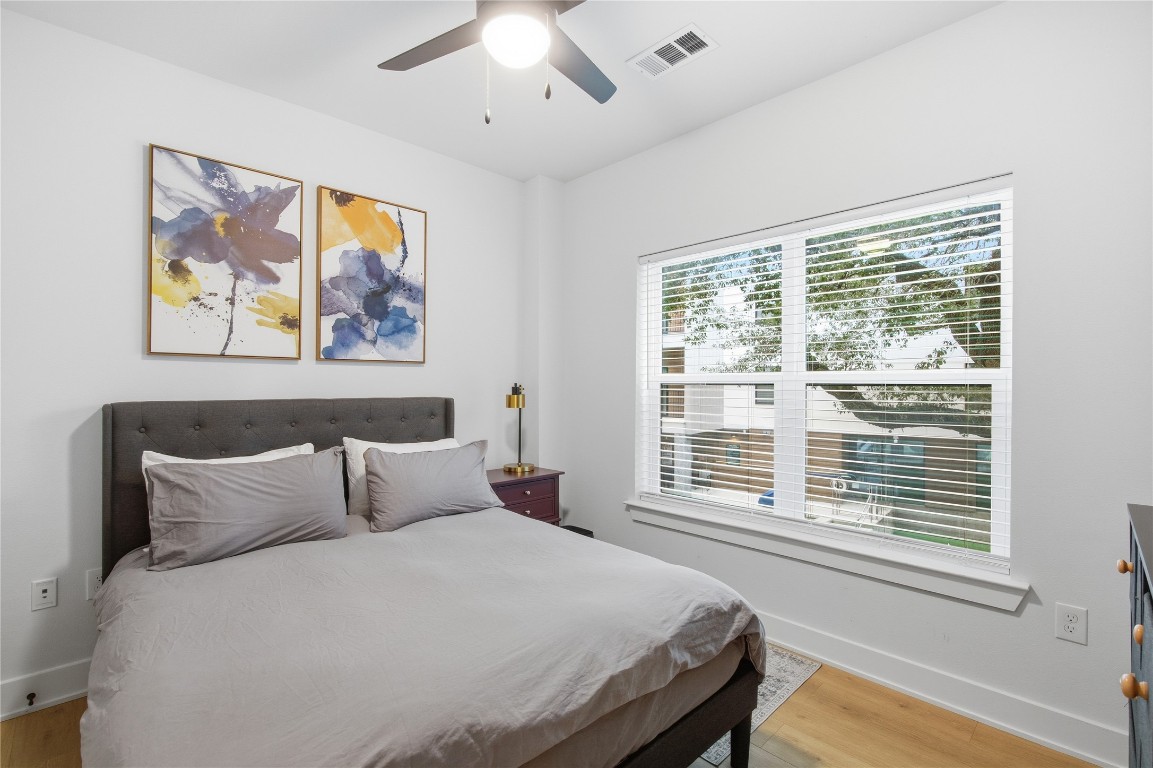 2500 Longview Street, Unit 201 Austin, TX 78705 - Photo 10 of 40 a bedroom with a bed and a window