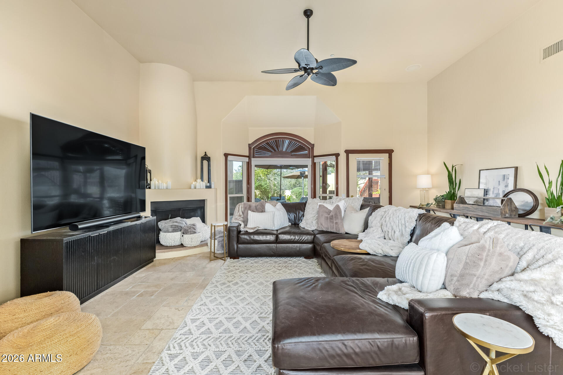 8549 East Bronco Trail Scottsdale, AZ 85255 - Photo 11 of 67 a living room with furniture and a flat screen tv