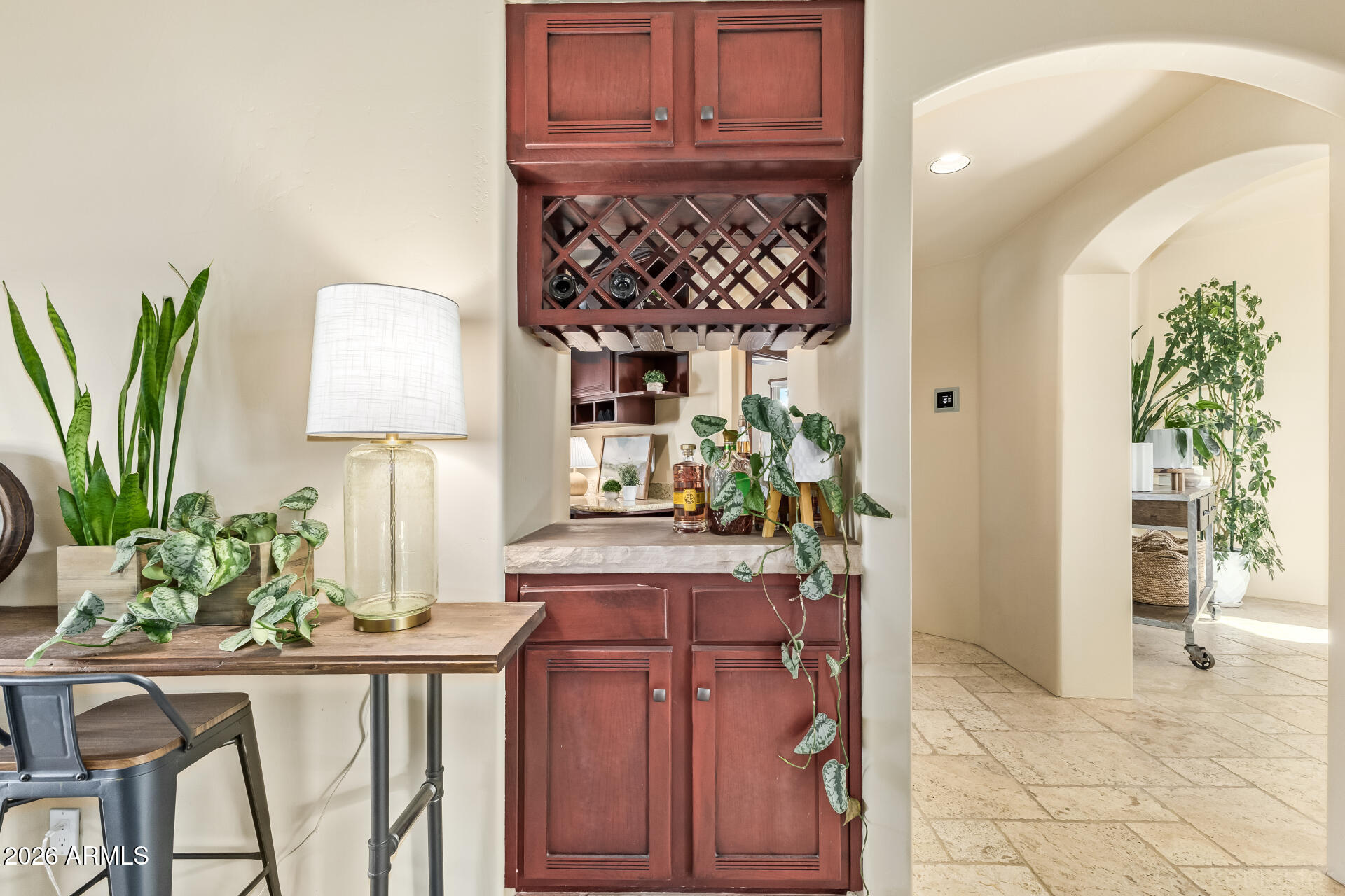 8549 East Bronco Trail Scottsdale, AZ 85255 - Photo 16 of 67 a living room with furniture and a potted plant