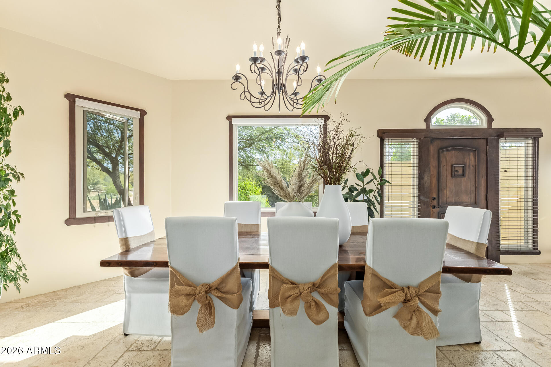 8549 East Bronco Trail Scottsdale, AZ 85255 - Photo 17 of 67 a view of a dining room with furniture and a window