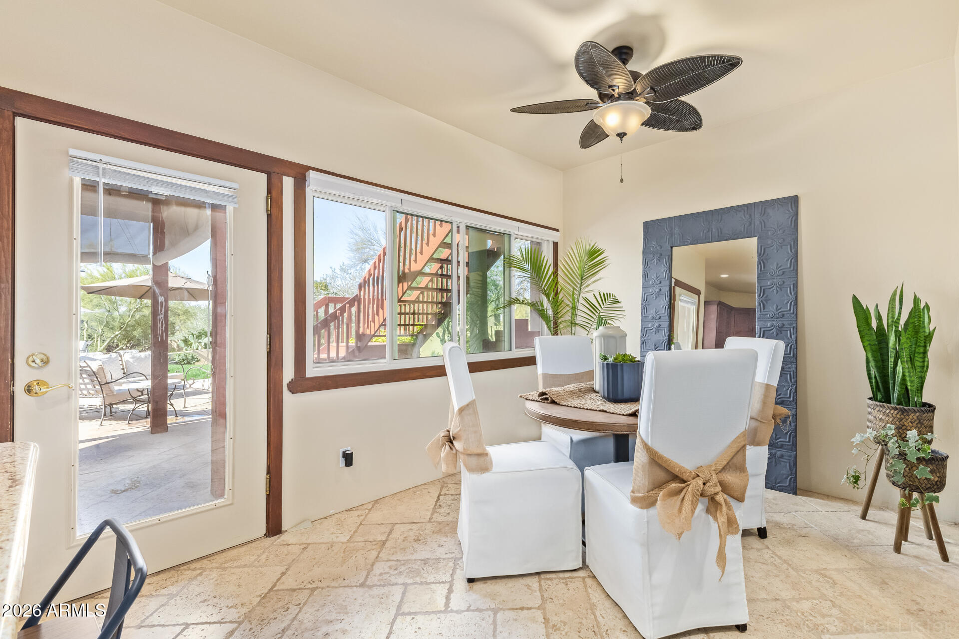 8549 East Bronco Trail Scottsdale, AZ 85255 - Photo 18 of 67 a view of a dining room with furniture window and outside view
