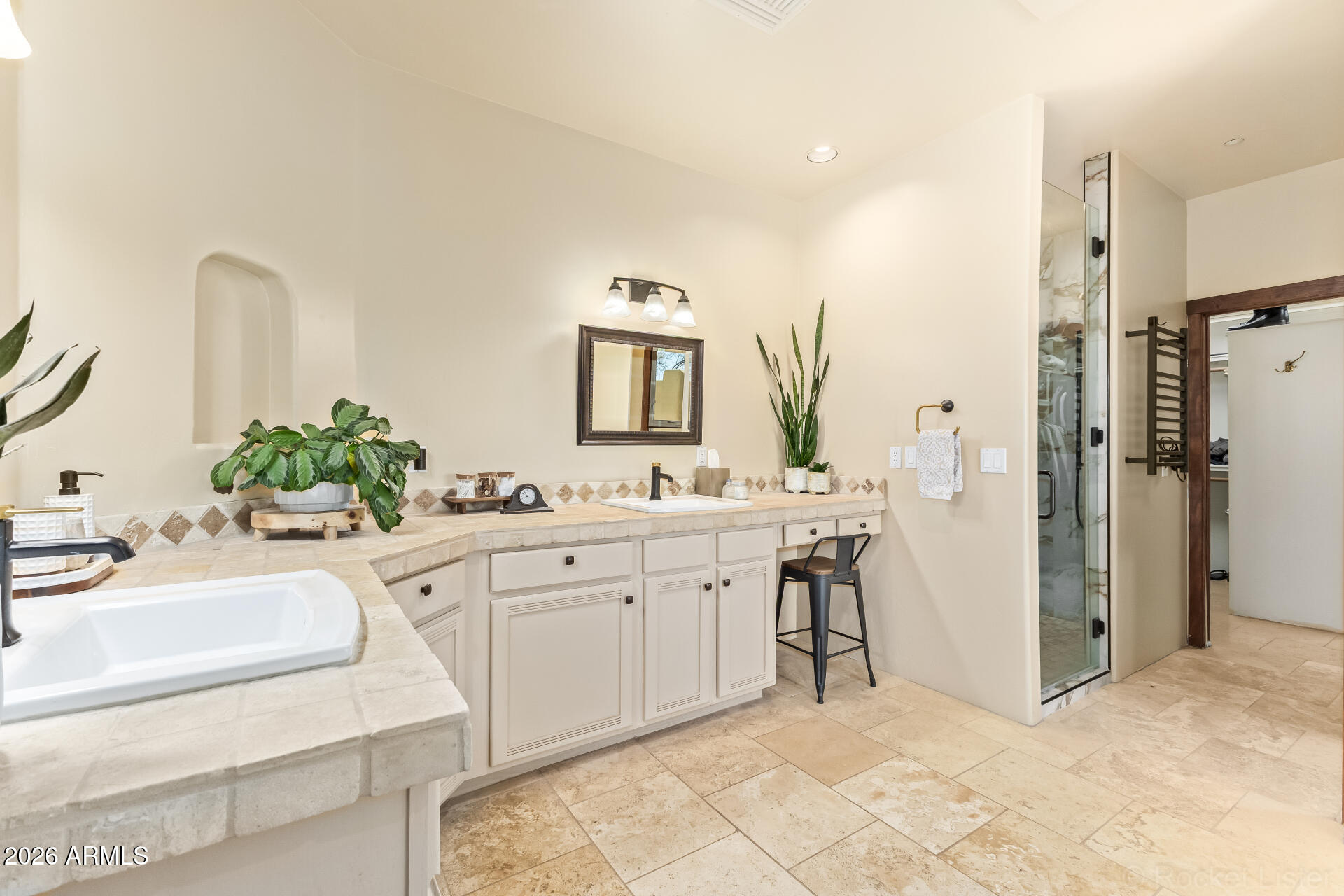 8549 East Bronco Trail Scottsdale, AZ 85255 - Photo 32 of 67 a spacious bathroom with a double vanity sink and a mirror