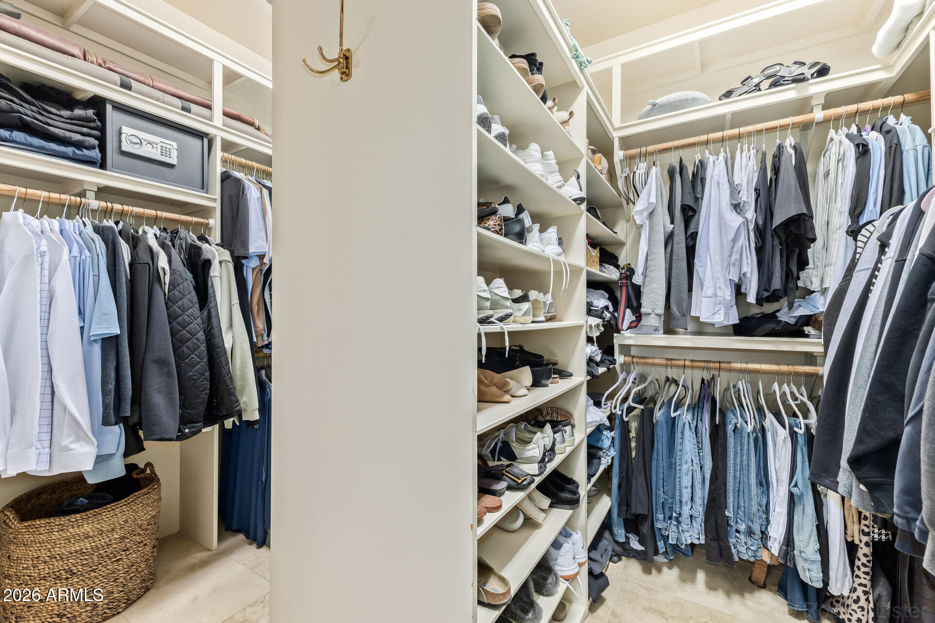 8549 East Bronco Trail Scottsdale, AZ 85255 - Photo 36 of 67 a view of walk in closet with clothes and shoes