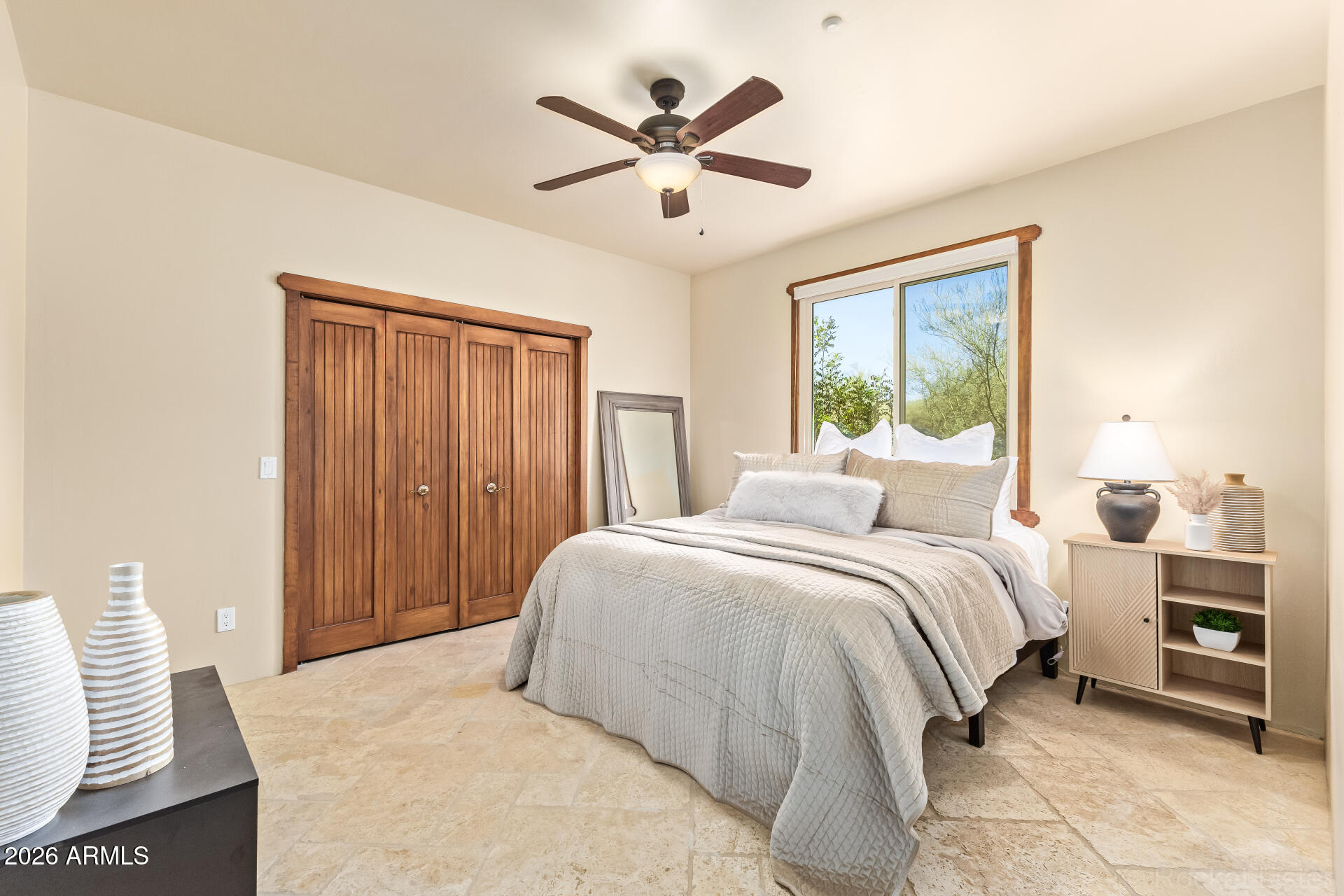 8549 East Bronco Trail Scottsdale, AZ 85255 - Photo 37 of 67 a bedroom with bed and window