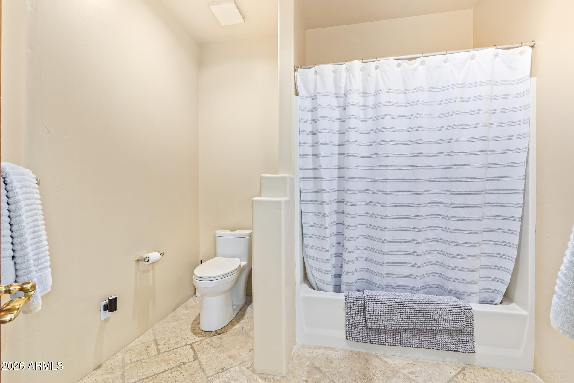 8549 East Bronco Trail Scottsdale, AZ 85255 - Photo 45 of 67 a bathroom with a white toilet and a shower