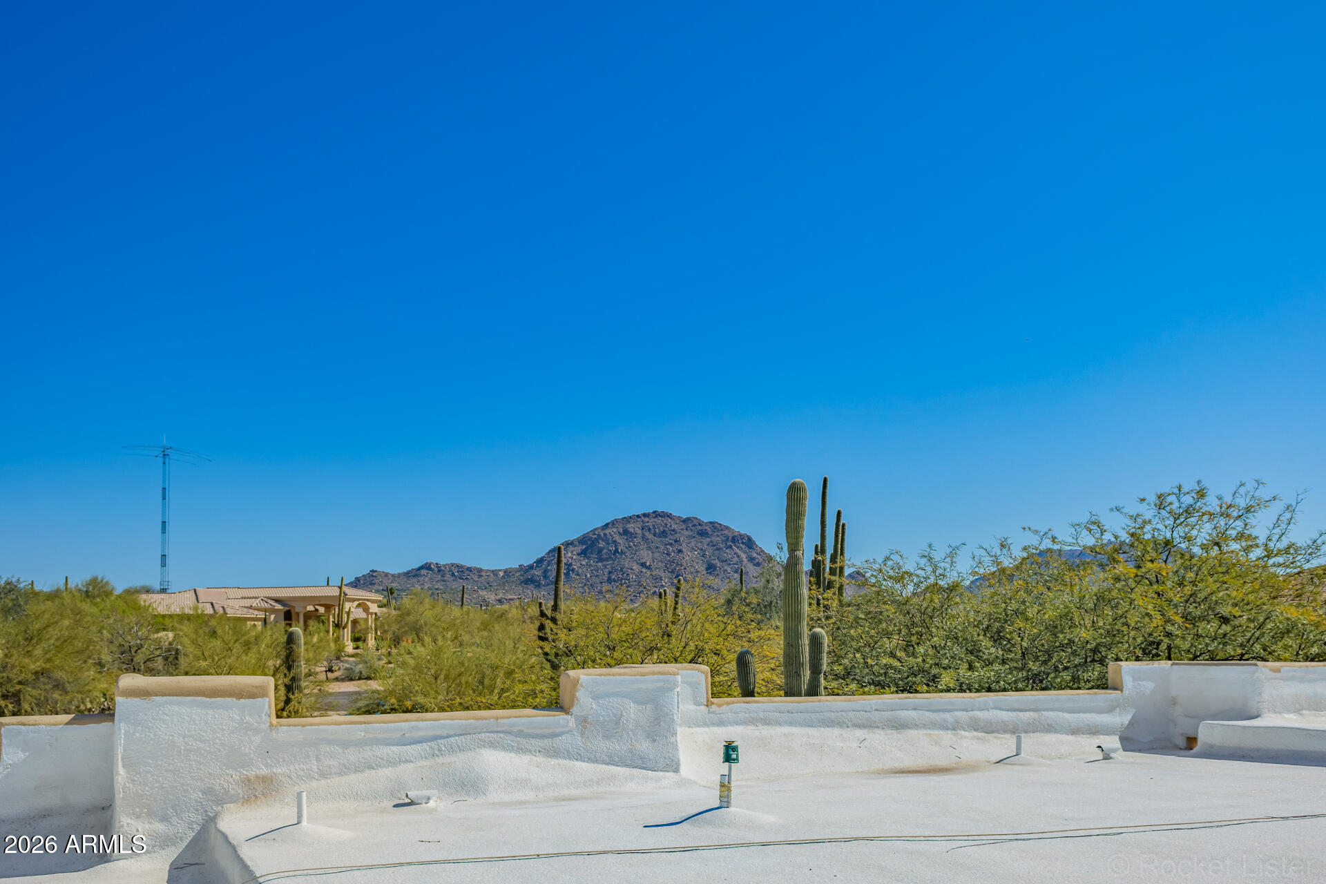 8549 East Bronco Trail Scottsdale, AZ 85255 - Photo 52 of 67 a view of a fountain with a small yard