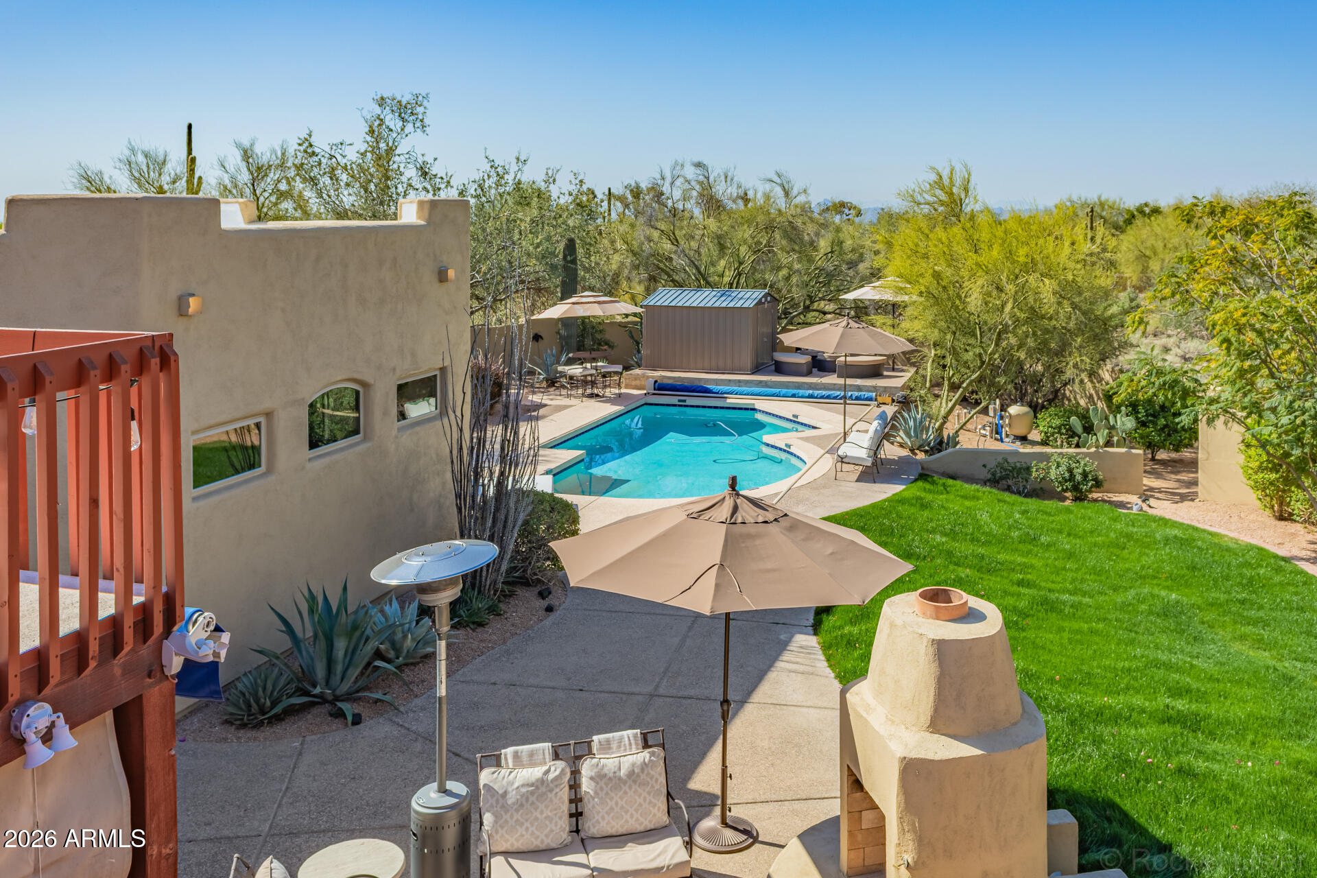 8549 East Bronco Trail Scottsdale, AZ 85255 - Photo 53 of 67 an aerial view of a house with garden space and street view