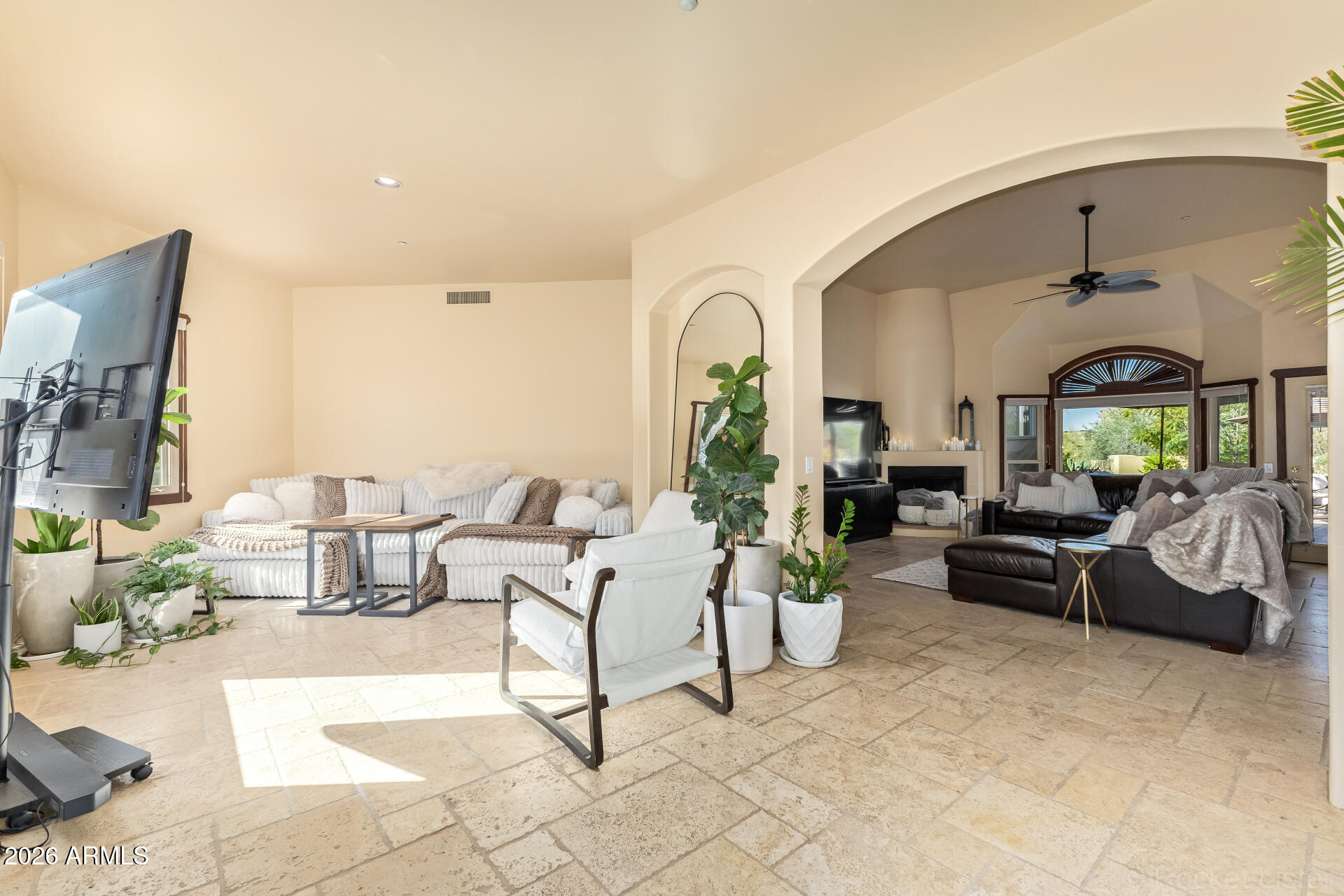 8549 East Bronco Trail Scottsdale, AZ 85255 - Photo 8 of 67 a living room with furniture and a large window