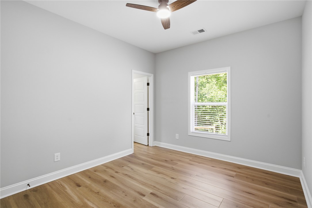 912 Watercrest Road West Union, SC 29696 - Photo 24 of 49 This bright room features a clean design with durable flooring, perfect for versatile living.