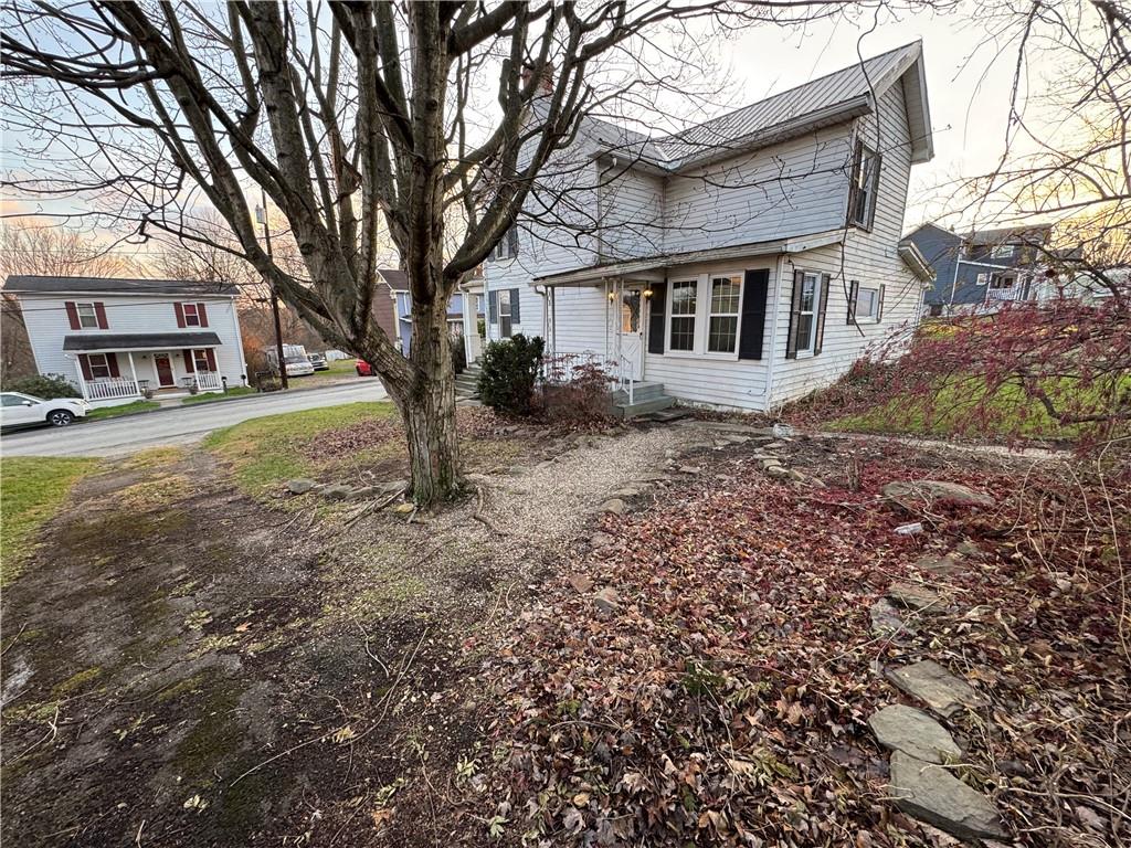 327 Rocktown Road Tarrs, PA 15688 - Photo 32 of 39 a view of a yard with a house and a tree
