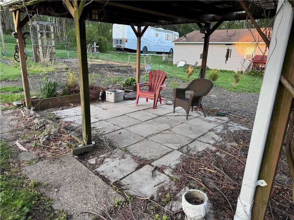 327 Rocktown Road Tarrs, PA 15688 - Photo 35 of 39 a backyard of a house with seating space