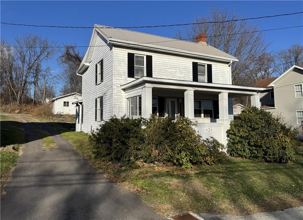 327 Rocktown Road Tarrs, PA 15688 - Photo 39 of 39 a front view of a house with garden