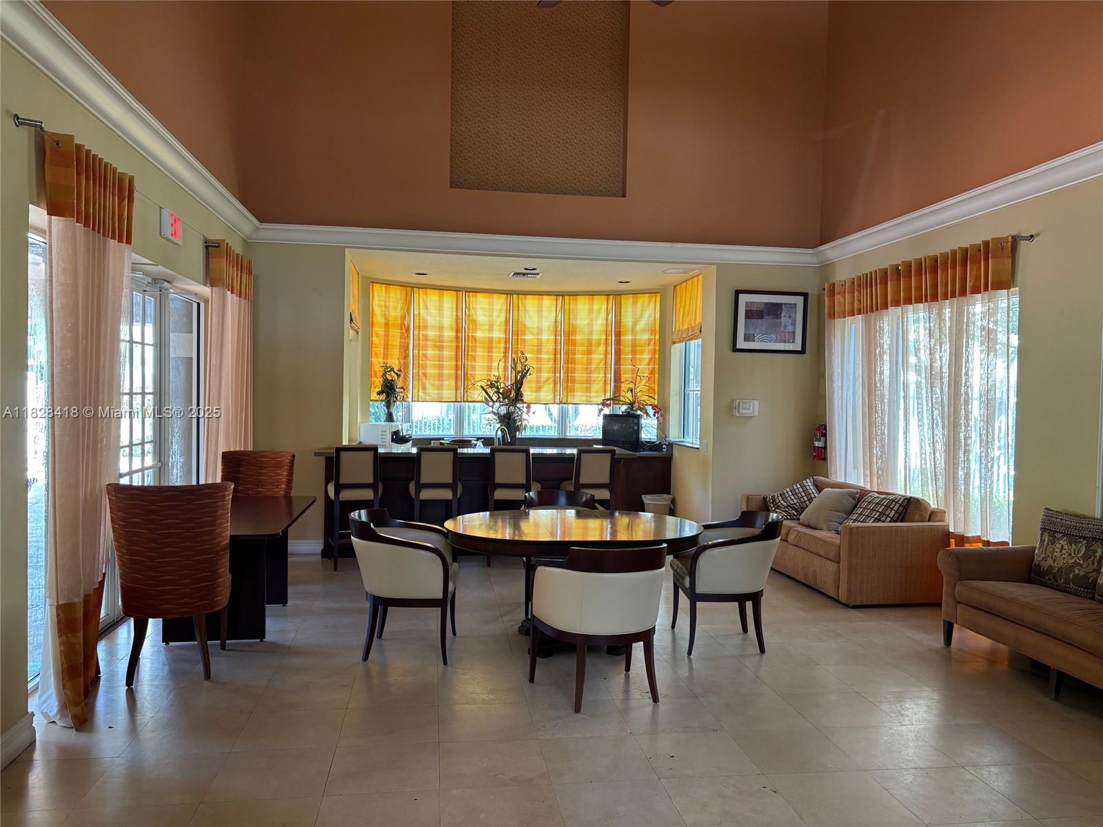 470 South Park Road, Unit 7308 Hollywood, FL 33021 - Photo 19 of 20 a living room with furniture and a large window