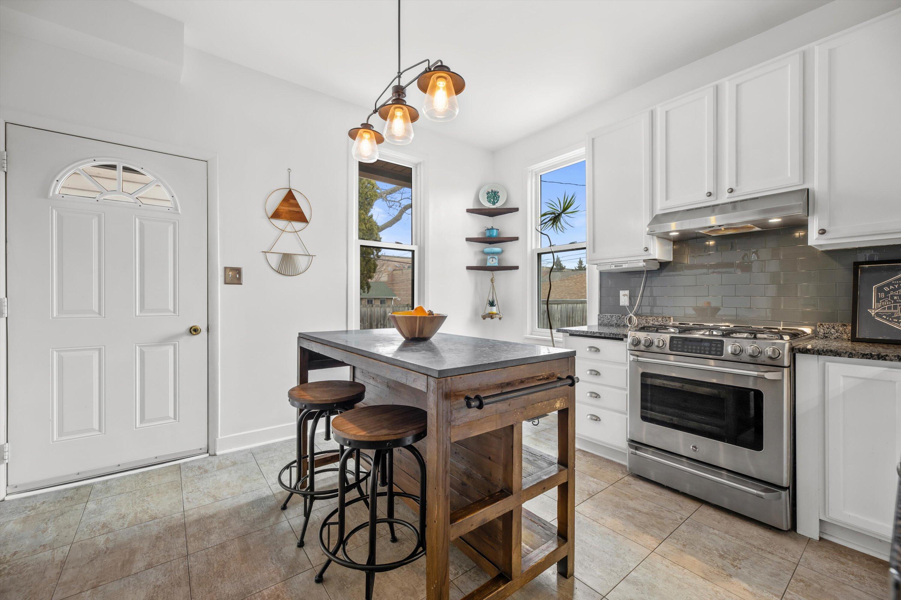 615 East Otjen Street Milwaukee, WI 53207 - Photo 22 of 63 Kitchen Island, Tile Floor, Stainless Steel Applainces