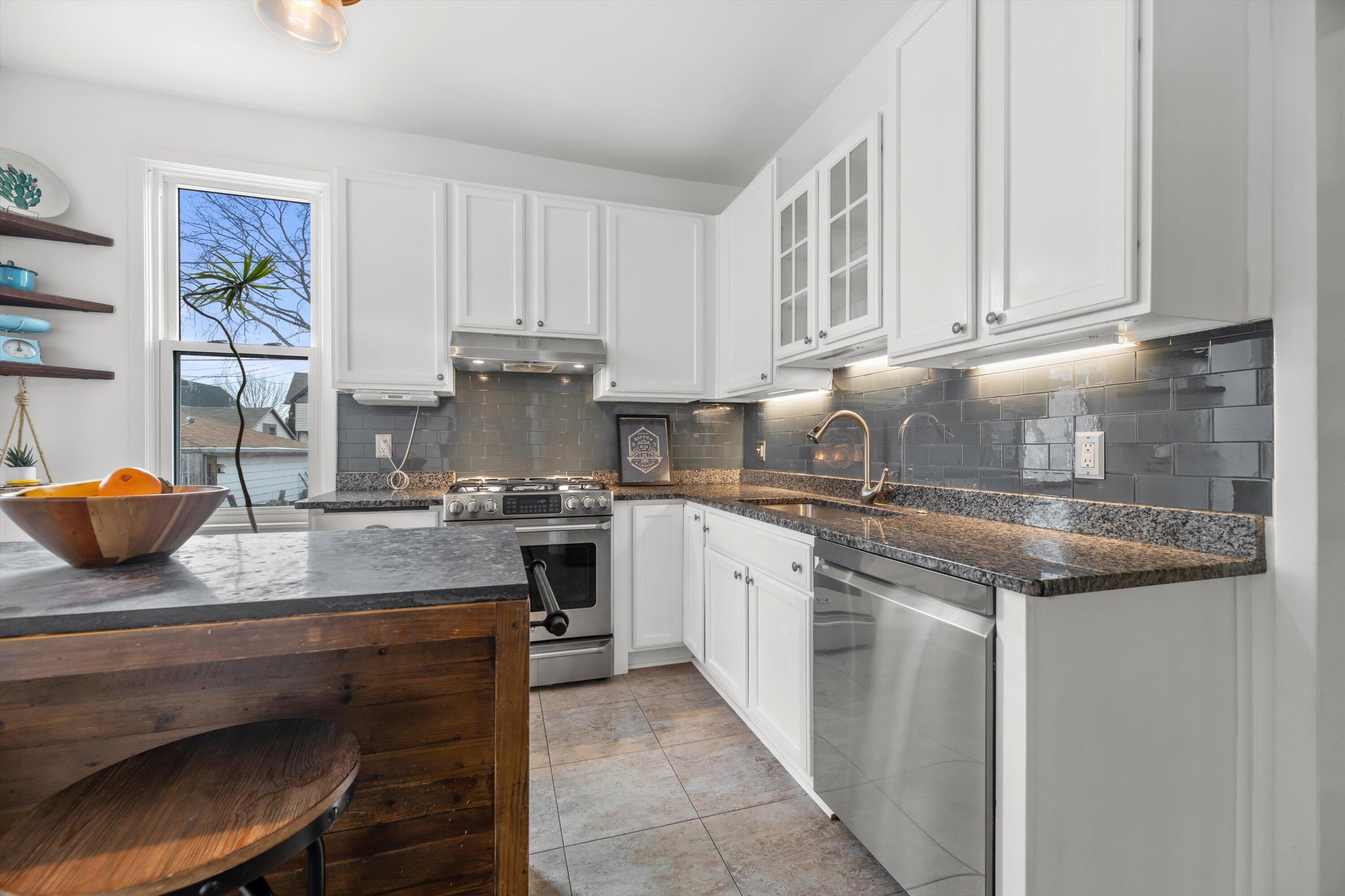 615 East Otjen Street Milwaukee, WI 53207 - Photo 23 of 63 Kitchen Island, Tile Floor, Stainless Steel Applainces
