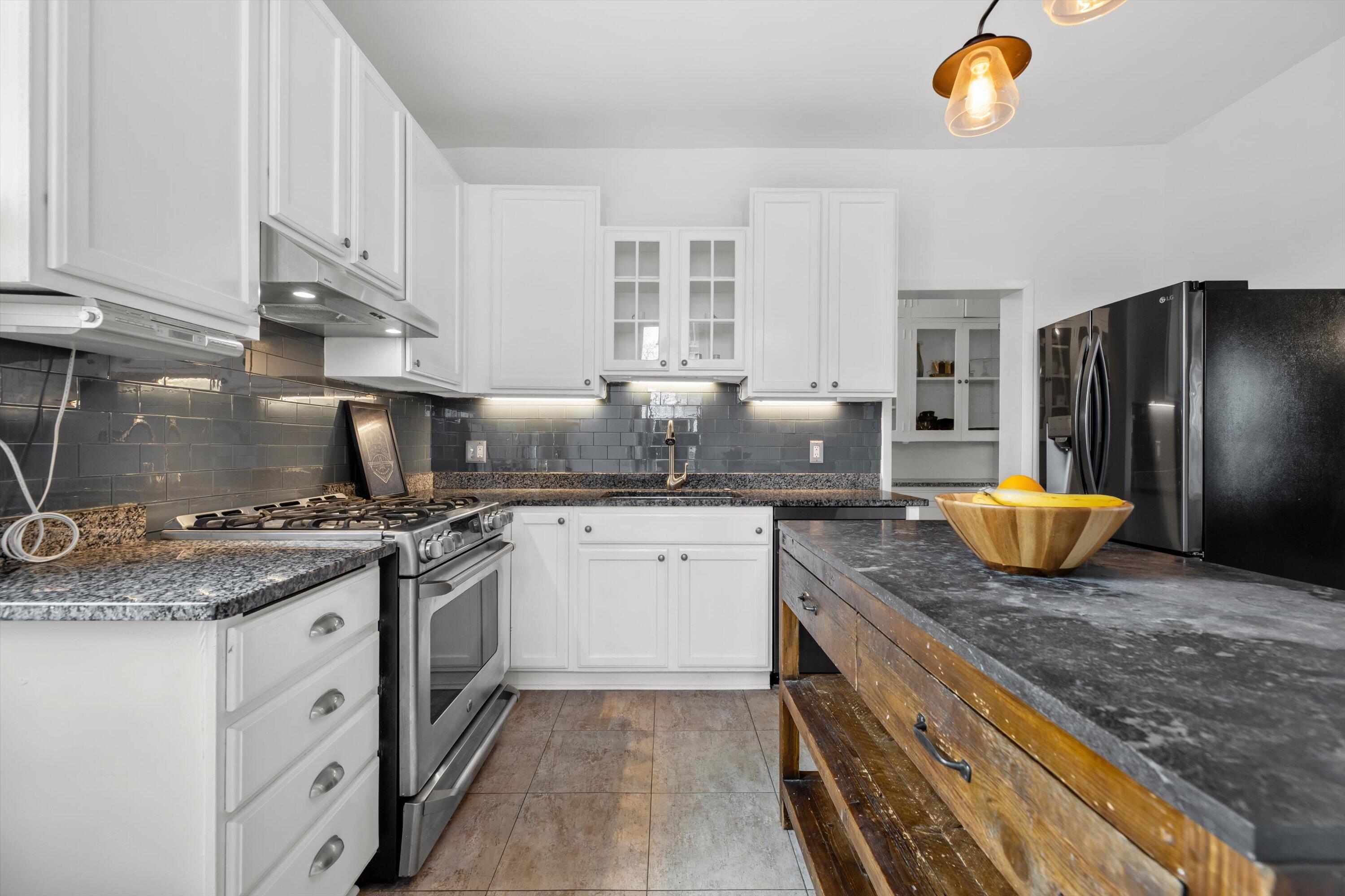 615 East Otjen Street Milwaukee, WI 53207 - Photo 24 of 63 Kitchen Island, Tile Floor, Stainless Steel Applainces