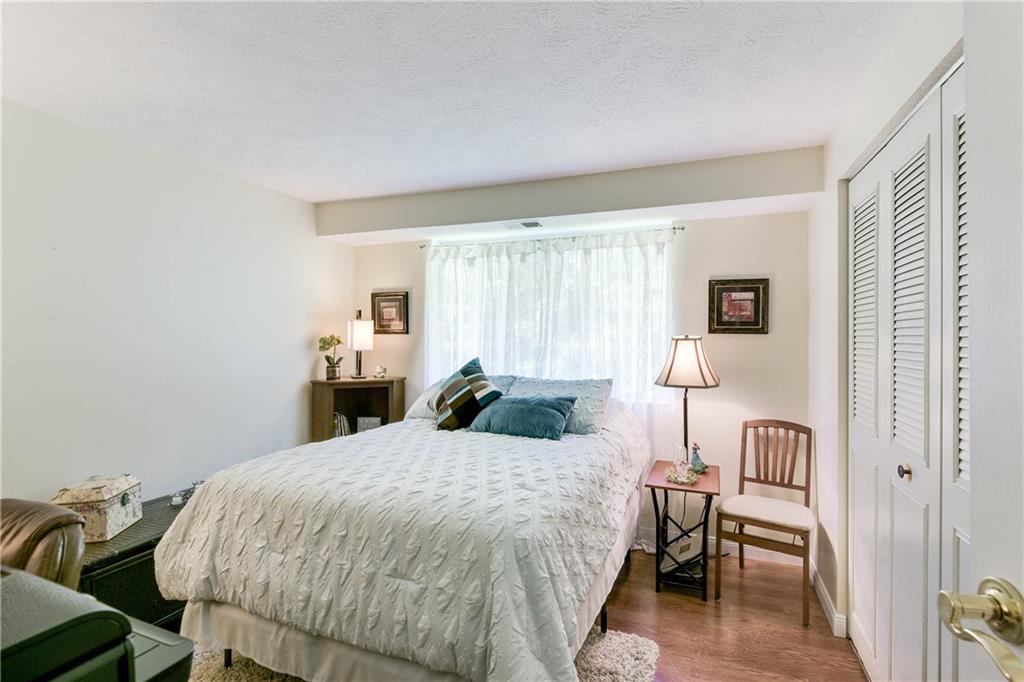 329 Ridge Point Circle, Unit 34B Bridgeville, PA 15017 - Photo 16 of 25 The second bedroom makes a great guest room, kid's room, home office, or even a second living room!