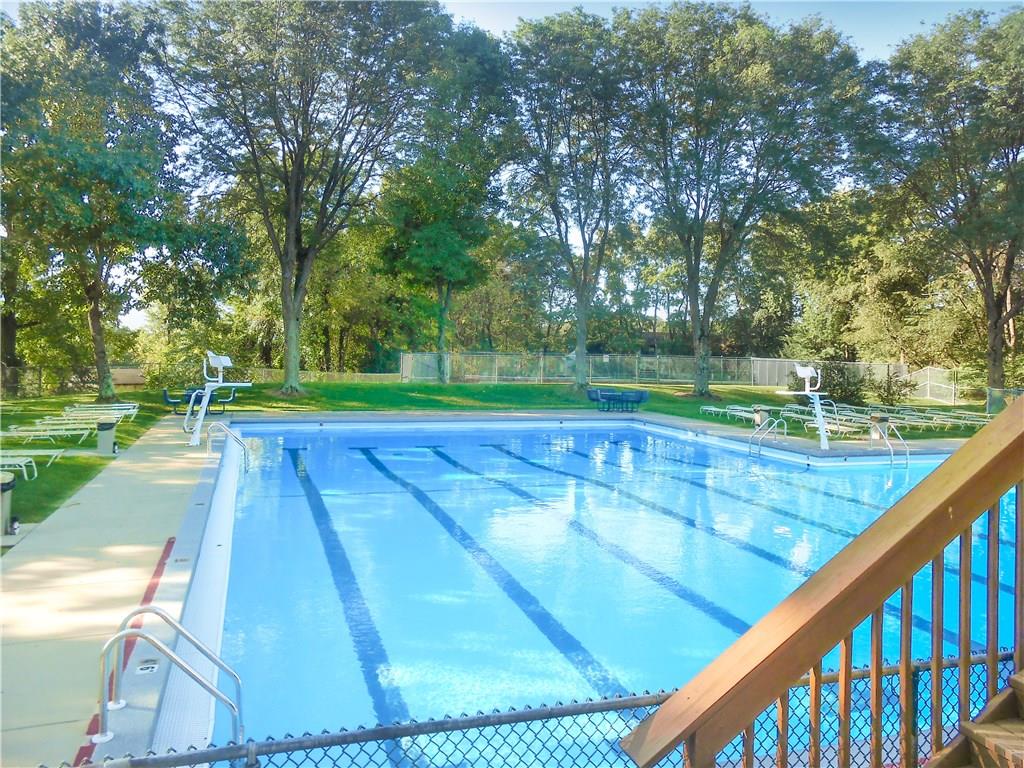 329 Ridge Point Circle, Unit 34B Bridgeville, PA 15017 - Photo 22 of 25 The community features many great amenities including a huge pool with plenty of surrounding space to sunbathe!