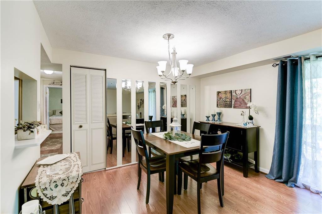 329 Ridge Point Circle, Unit 34B Bridgeville, PA 15017 - Photo 6 of 25 Beyond your living room, a central dining room is a great space to gather with family and friends!