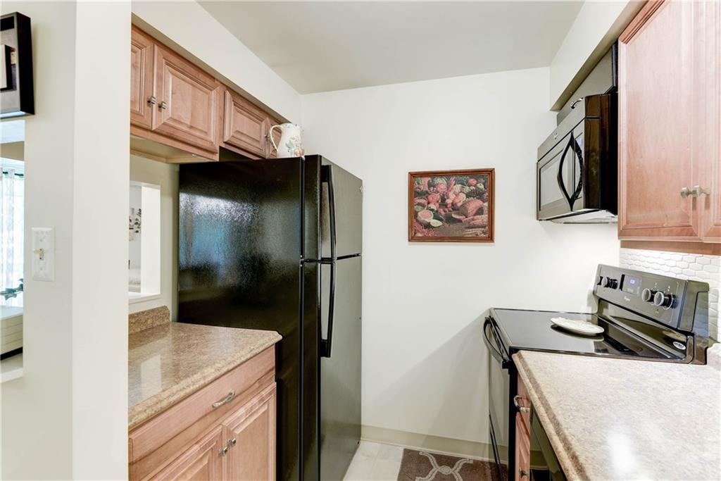 329 Ridge Point Circle, Unit 34B Bridgeville, PA 15017 - Photo 10 of 25 Extra counter space gives you plenty of opportunity to spread out when cooking meals.