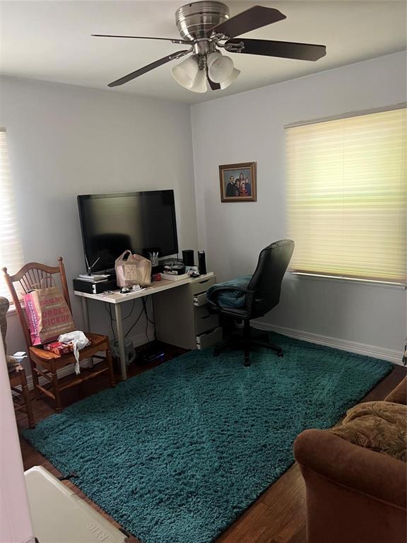 2211 Muret Street Irving, TX 75062 - Photo 14 of 16 a living room with furniture and a flat screen tv