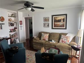 2211 Muret Street Irving, TX 75062 - Photo 4 of 16 a living room with furniture and a flat screen tv