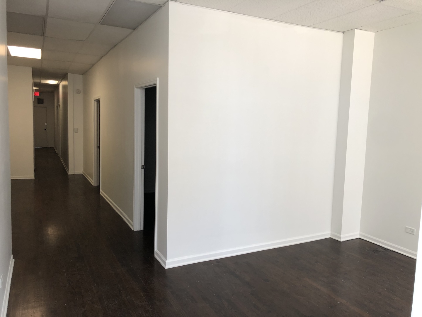 2449 North Clybourn Avenue, Unit 1 Chicago, IL 60614 - Photo 2 of 10 a view of a hallway with wooden floor