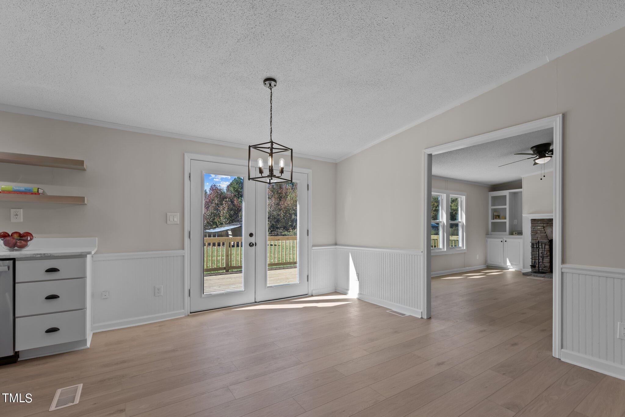 3416 Carr Store Road Cedar Grove, NC 27231 - Photo 9 of 39 Dining room looking into Den