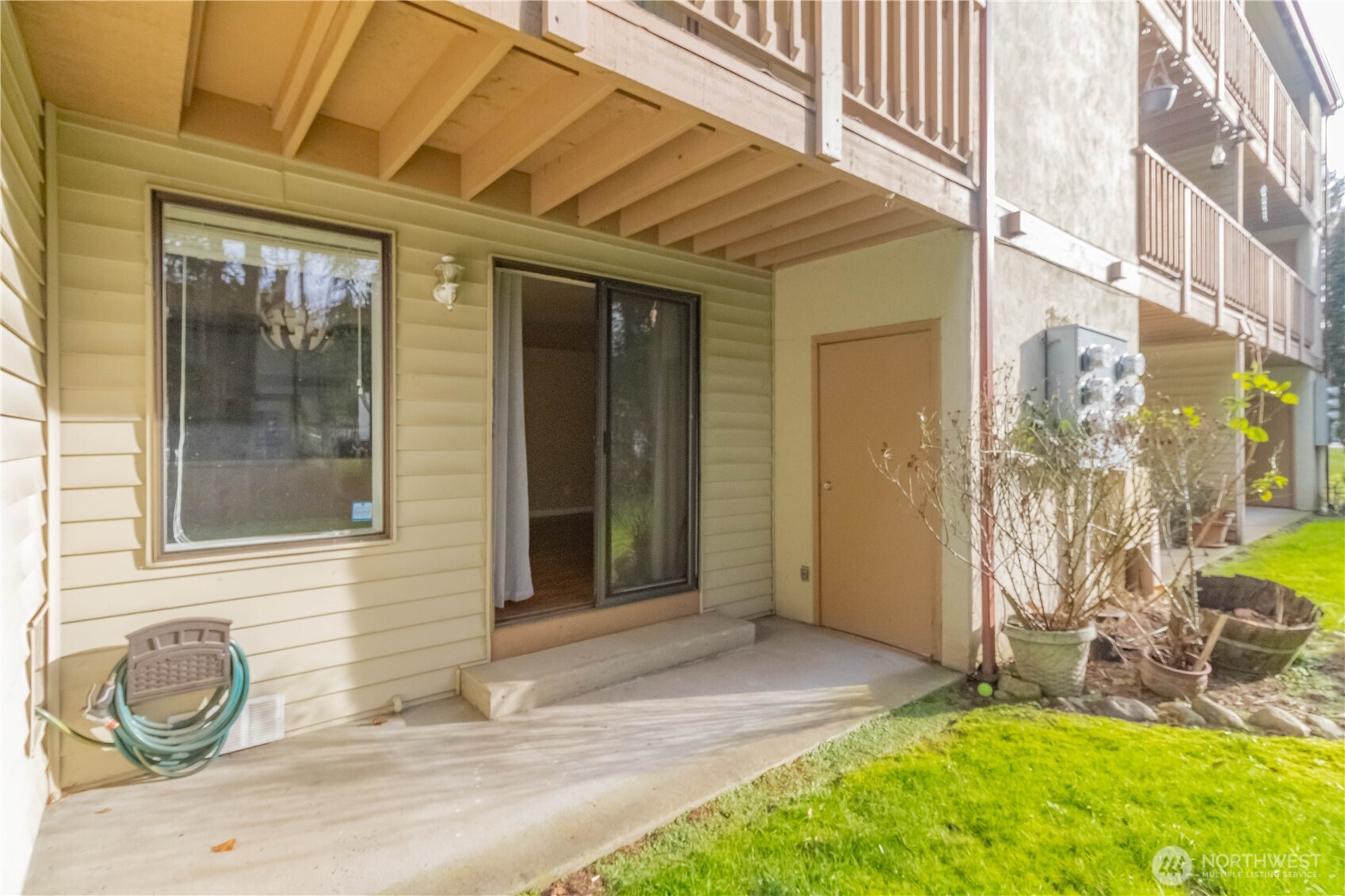 17425 119th Lane Southeast, Unit D12 Renton, WA 98058 - Photo 20 of 25 a front view of a house