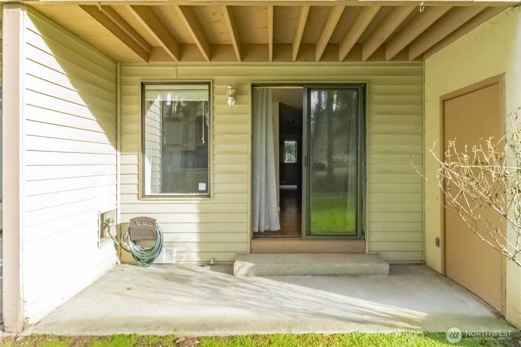 17425 119th Lane Southeast, Unit D12 Renton, WA 98058 - Photo 21 of 25 a view of entrance door of the house