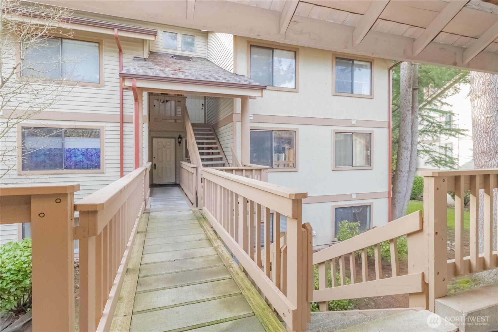 17425 119th Lane Southeast, Unit D12 Renton, WA 98058 - Photo 22 of 25 a view of a house with a deck