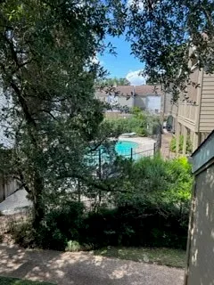wooden floor fireplace and natural light in room