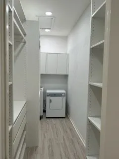 a bathroom with a sink vanity and mirror