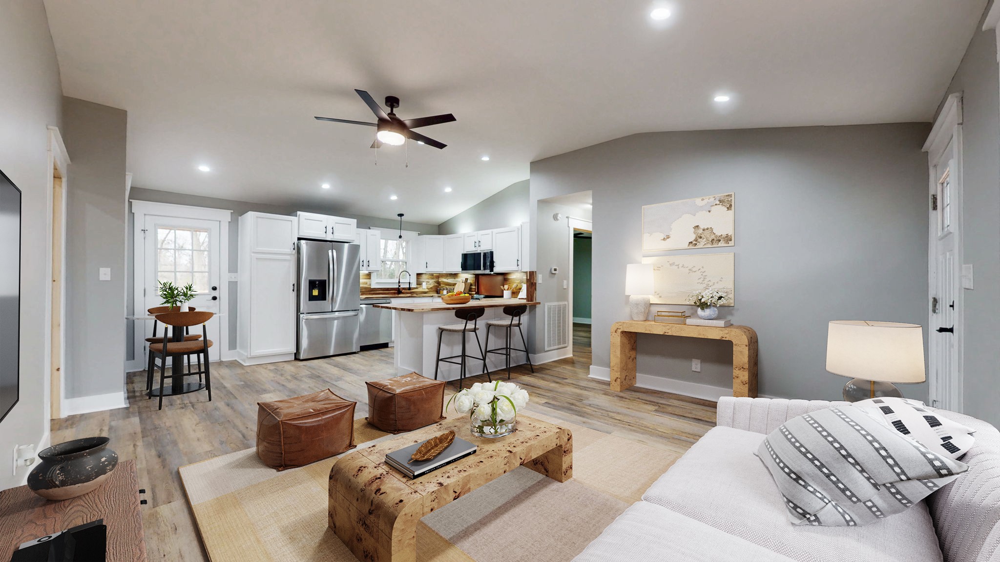 108 Decatur Street Shelbyville, TN 37160 - Photo 12 of 33 a living room with furniture kitchen view and a wooden floor