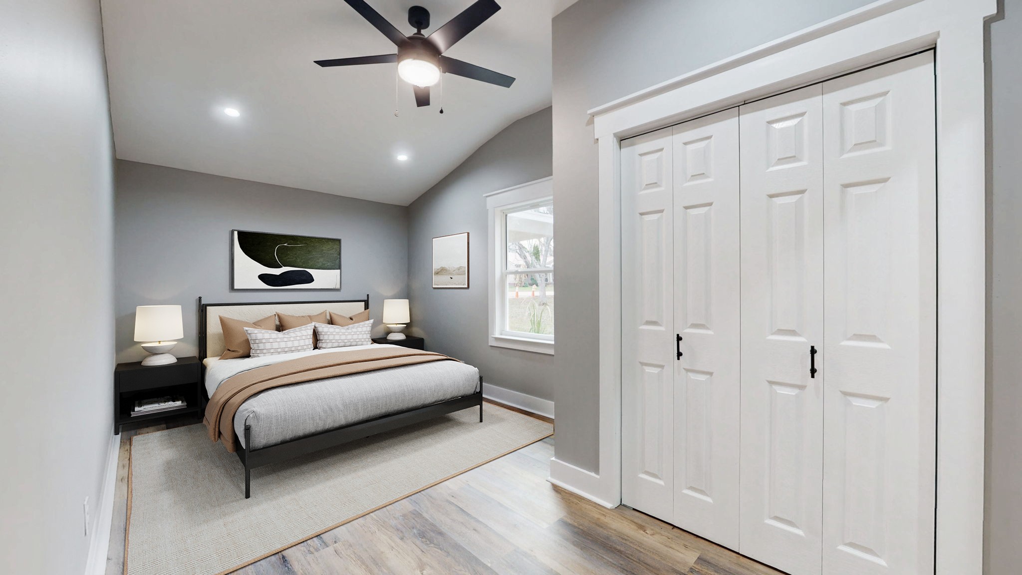 108 Decatur Street Shelbyville, TN 37160 - Photo 22 of 33 a bedroom with a large bed a flat tv screen and balcony