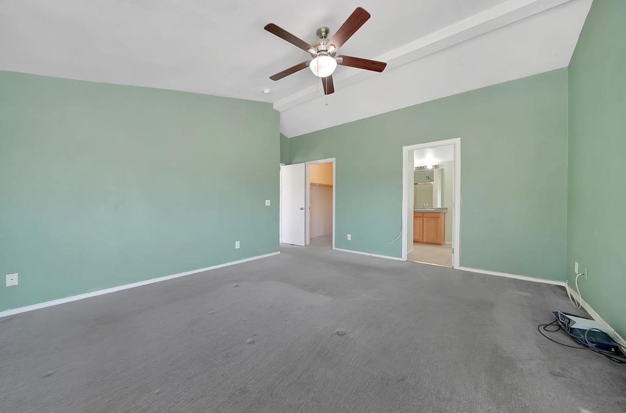 3155 Hawver Road San Andreas, CA 95249 - Photo 18 of 62 an empty room with a ceiling fan and window