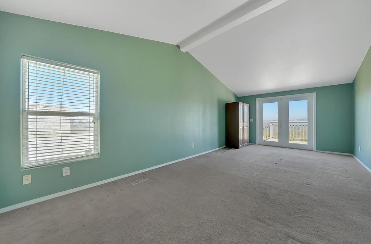 3155 Hawver Road San Andreas, CA 95249 - Photo 23 of 62 a view of an empty room with a window and a fireplace