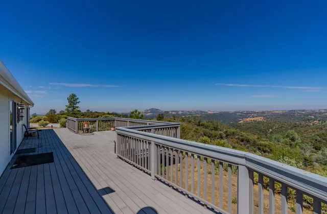a view of a balcony with chair