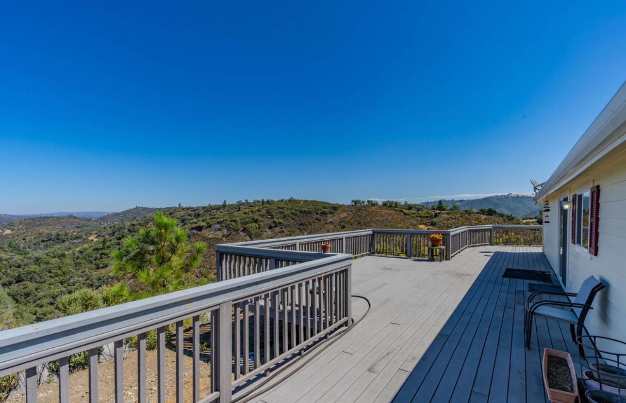 3155 Hawver Road San Andreas, CA 95249 - Photo 29 of 62 a view of a balcony with wooden floor and city view