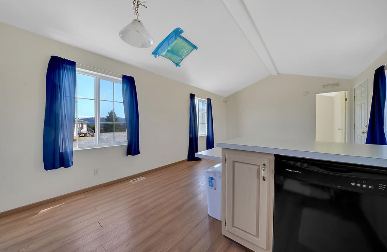 3155 Hawver Road San Andreas, CA 95249 - Photo 34 of 62 a kitchen with wooden floor and window